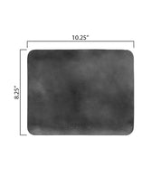 A rectangular black leather Launcher Mouse Pad with a suede underside from Bed Stu, measuring 10.25 inches by 8.25 inches, perfect for a curated workspace.