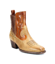 A single brown leather Western boot with decorative stitching and a medium heel from the League collection by Bed Stu.