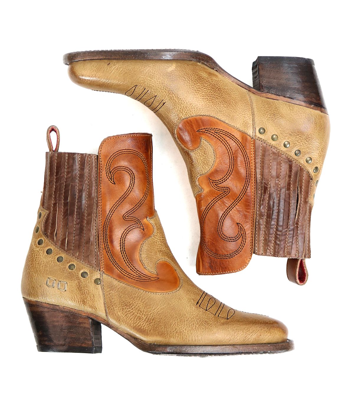 Introducing the League by Bed Stu: A pair of short brown leather Western boots adorned with decorative stitching and small metal studs. These stylish boots feature a ribbed ankle section and a wooden heel, perfect for a fashionable ride. Shown on a white background.