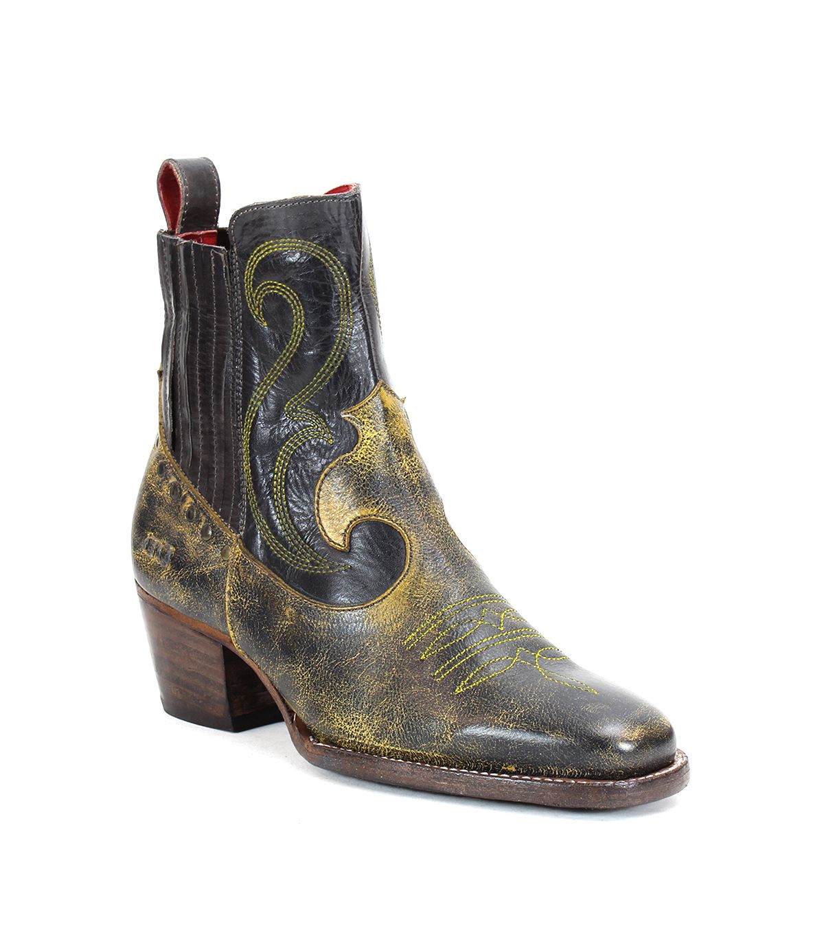 The League boot by Bed Stu is a single stylish leather cowboy boot featuring intricate, playful yellow stitching, a short stacked heel, and an elastic side panel that exudes Western rugged charm.