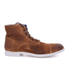 A pair of men's brown Leonardo boots with laces and a white sole by Bed Stu.