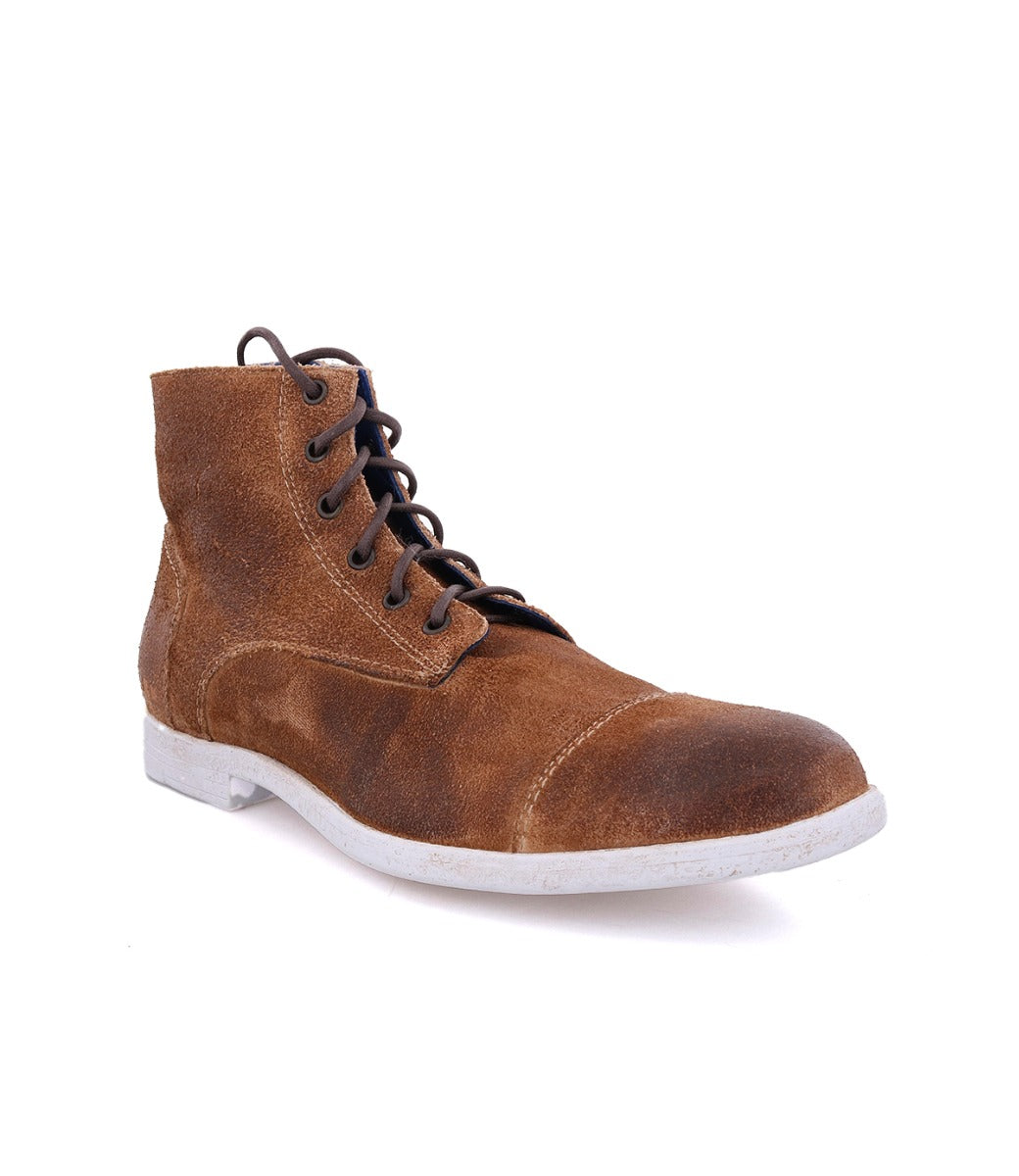 A men's Leonardo boot from Bed Stu with laces and a white sole.
