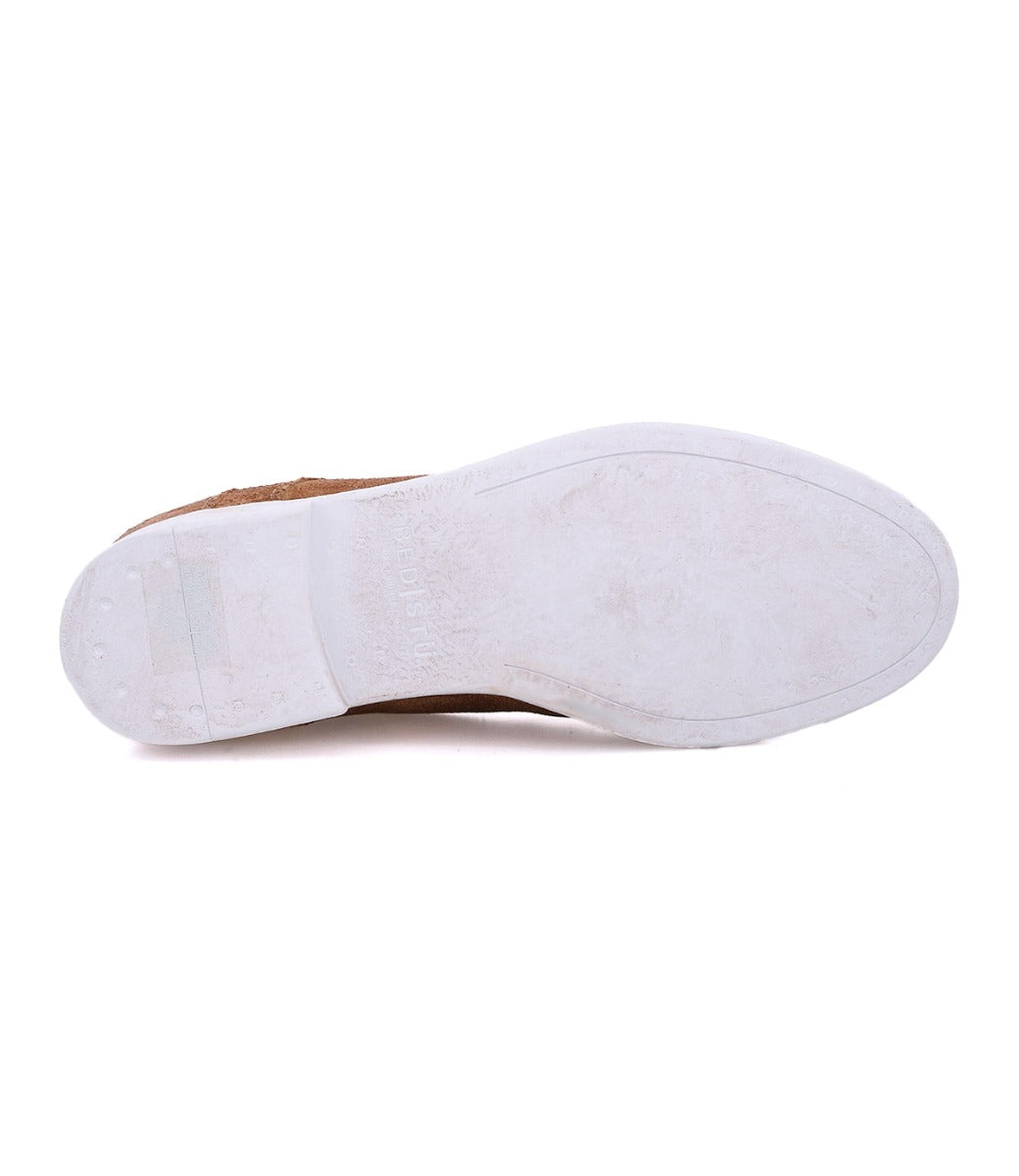 A pair of Leonardo shoes with white soles on a white background by Bed Stu.