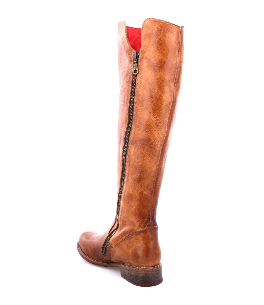 A Letizia by Bed Stu, women's brown leather tall boot with a red zipper.