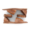 A pair of Bed Stu Lilia tan leather sandals on a white background.