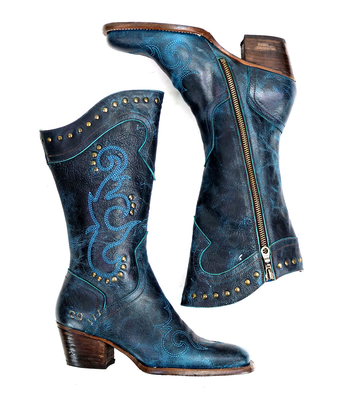 A pair of blue leather, mid-calf cowboy boots called "Limit" by Bed Stu, featuring decorative stitching, metal studs, and side zippers.