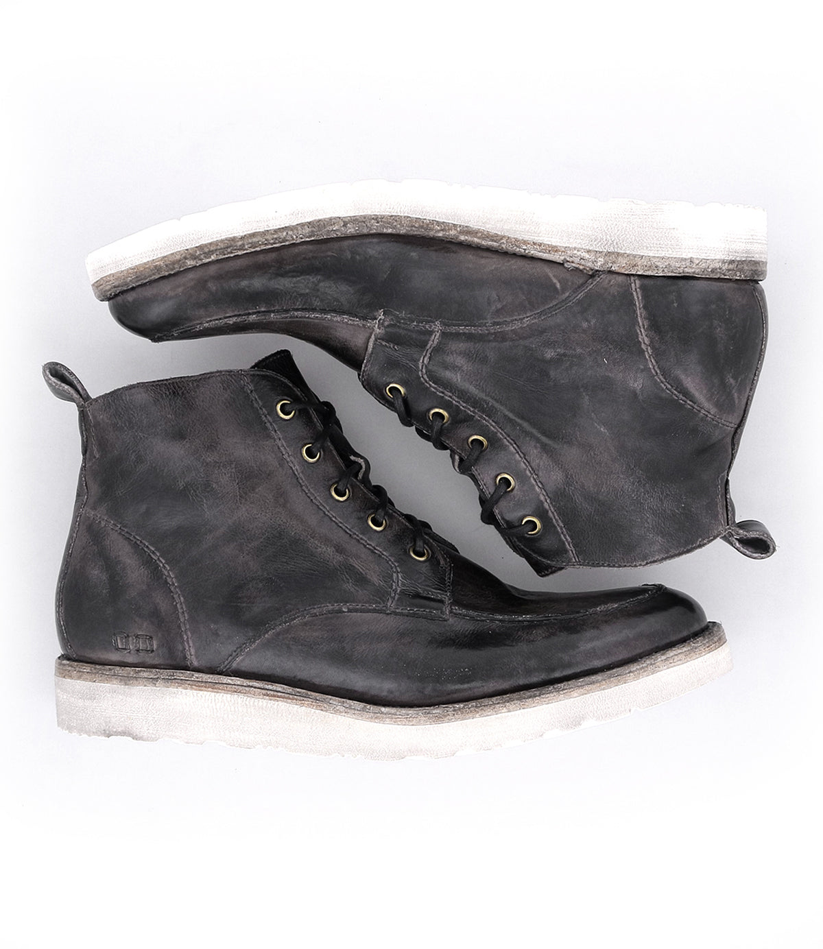 A pair of Bed Stu Lincoln men's black leather boots.