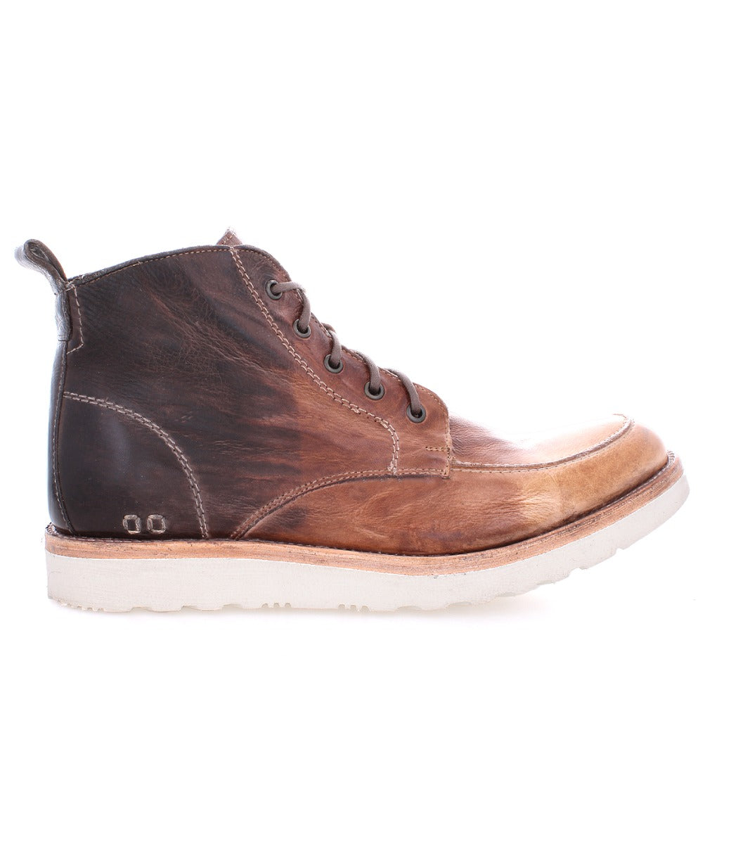 A men's Lincoln leather boot with laces and a white sole by Bed Stu.