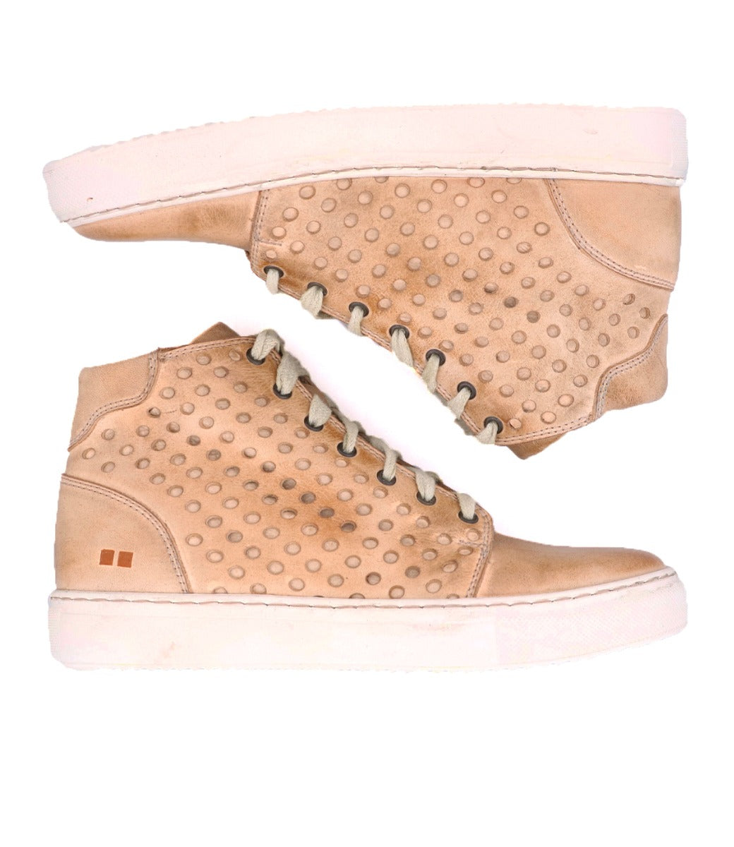 A pair of women's leather sneaker Lirica by Bed Stu.