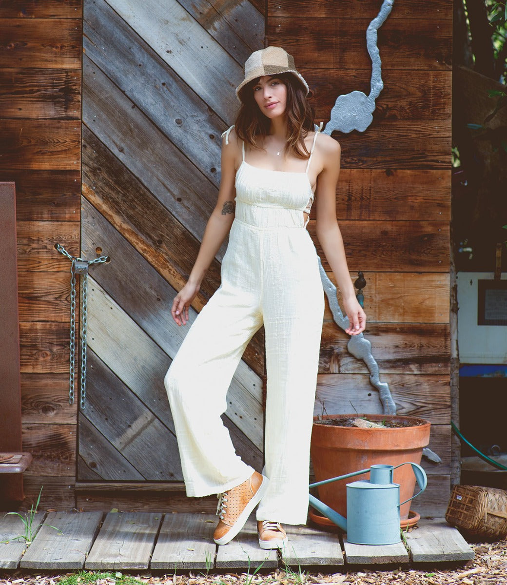A woman wearing a pair of leather sneaker Lirica by Bed Stu.