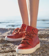 A woman wearing a pair of leather sneaker Lirica by Bed Stu.