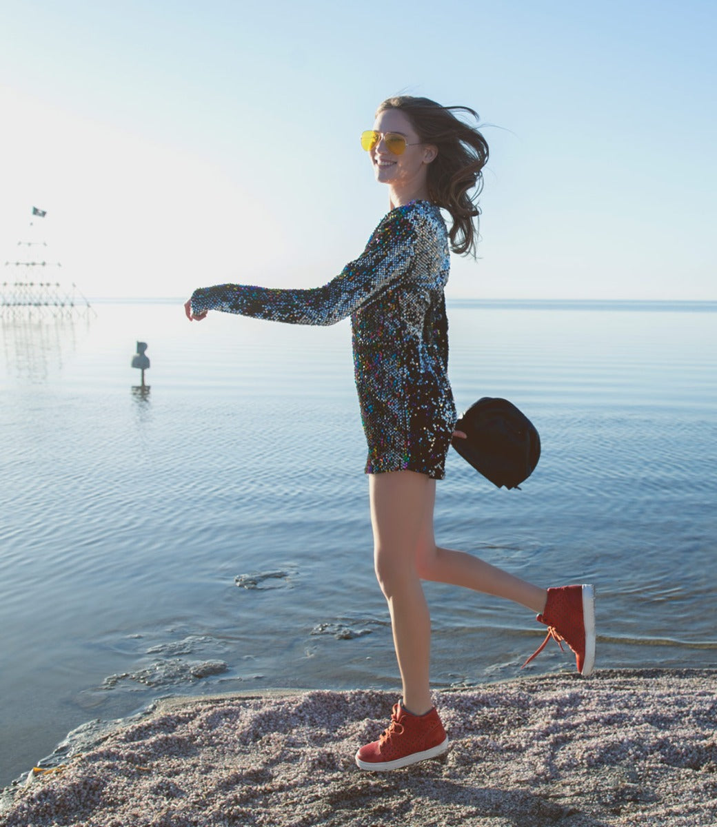 A woman wearing a pair of leather sneaker Lirica by Bed Stu.