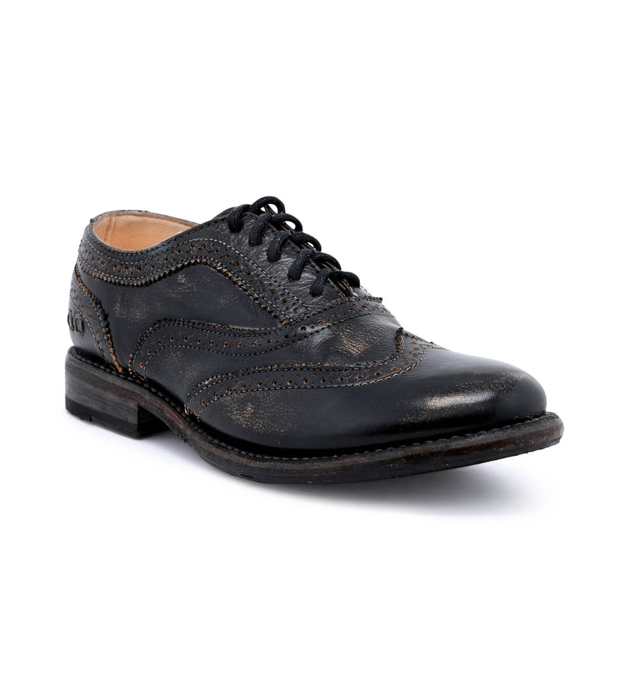 A women's distressed black wingtip oxford shoe called "Lita" by Bed Stu.
