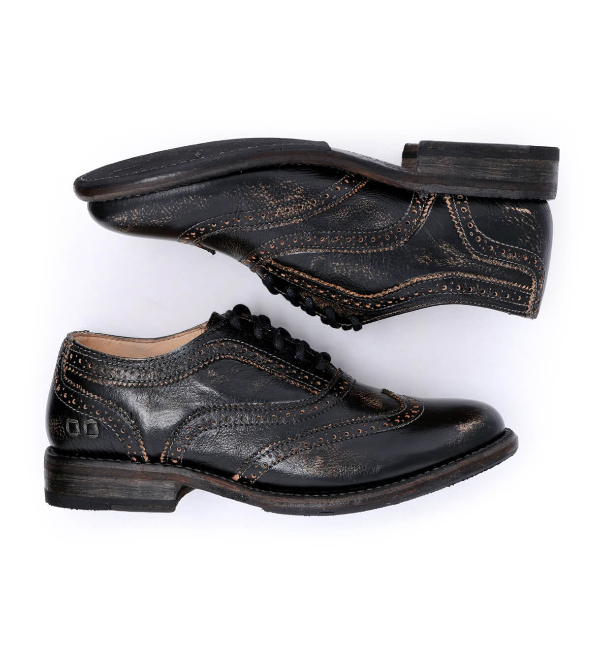 A pair of black Bed Stu Lita shoes on a white background.