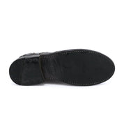 Outsole of the distressed black wingtip oxford shoe called "Lita" by Bed Stu.