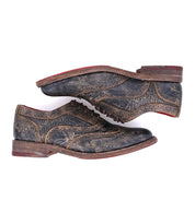 A pair of Bed Stu Lita shoes with a brown leather sole.
