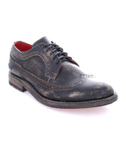 A women's black wingtip Oxford shoe, the Lita K II by Bed Stu, on a white background.