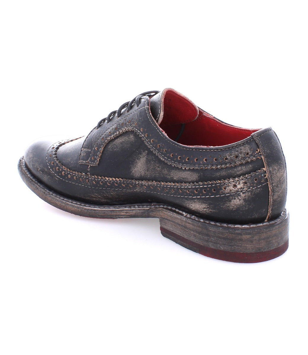 A women's Bed Stu Lita K II wingtip oxford shoe with red soles.