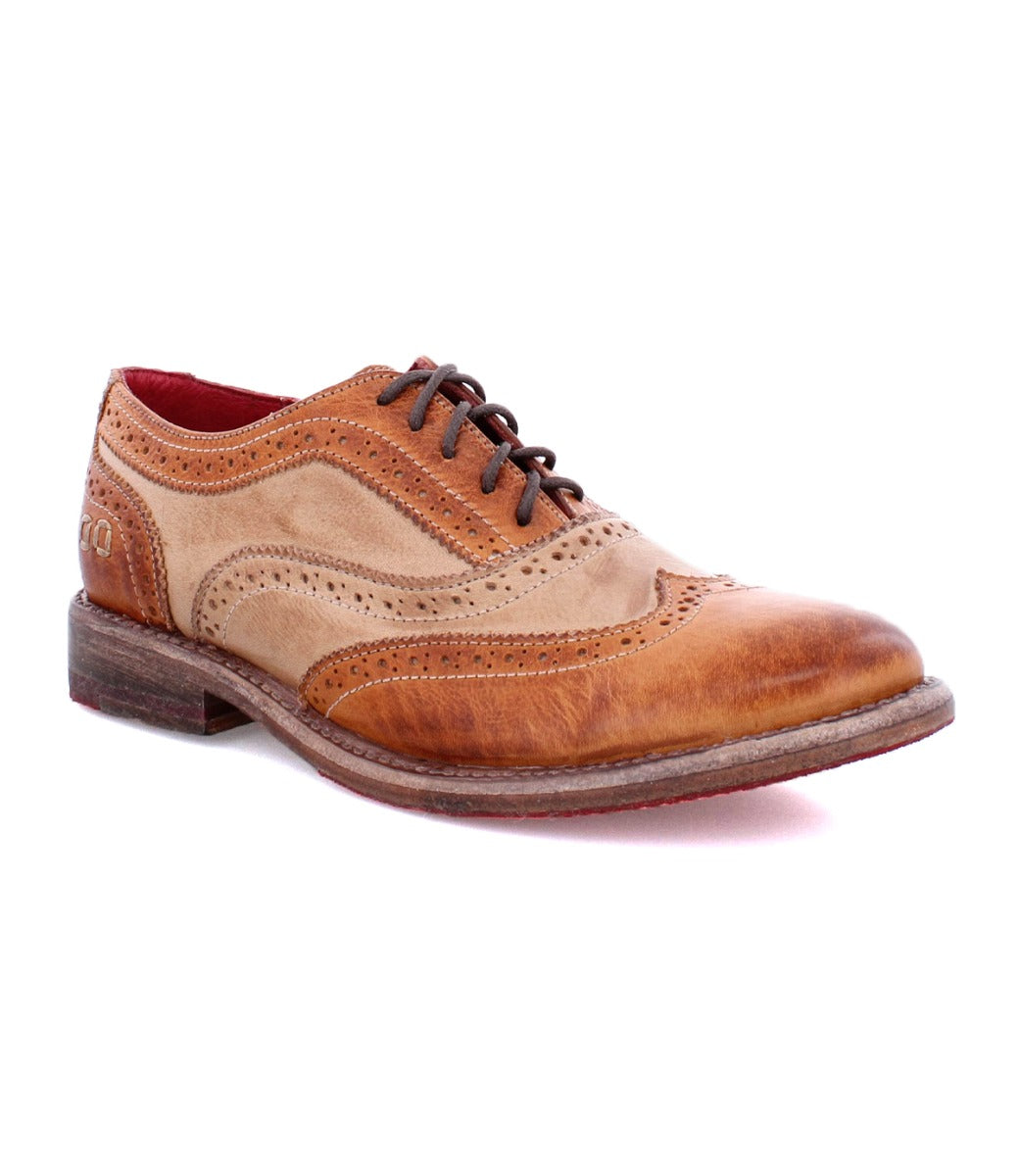 A tan and brown wingtip oxford shoe called "Lita" by Bed Stu.