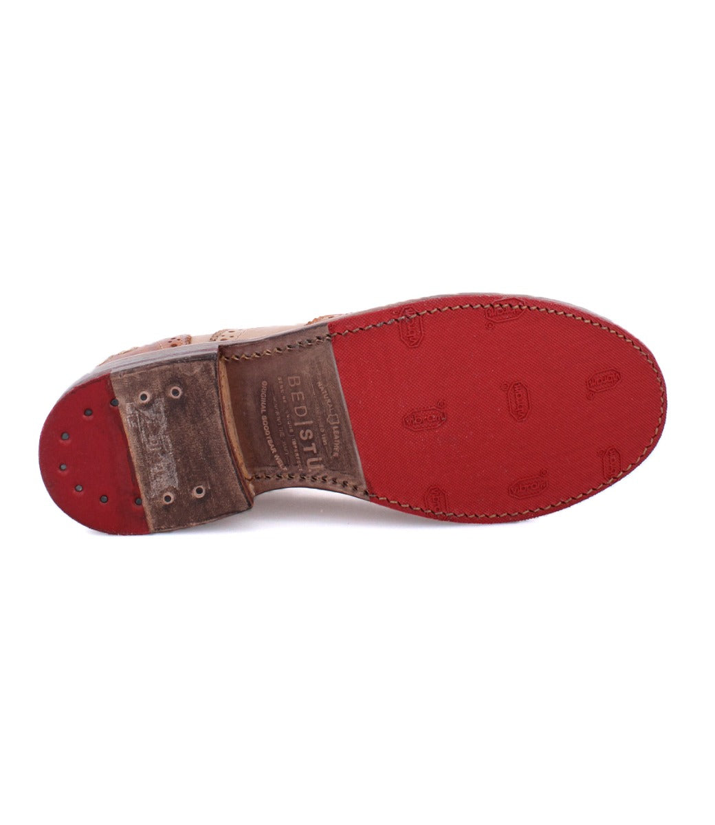 Lita shoes by Bed Stu with red sole.