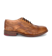 A tan wingtip oxford shoe, called the Lita by Bed Stu.