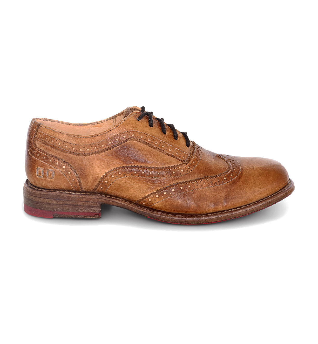 A tan wingtip oxford shoe, called the Lita by Bed Stu.