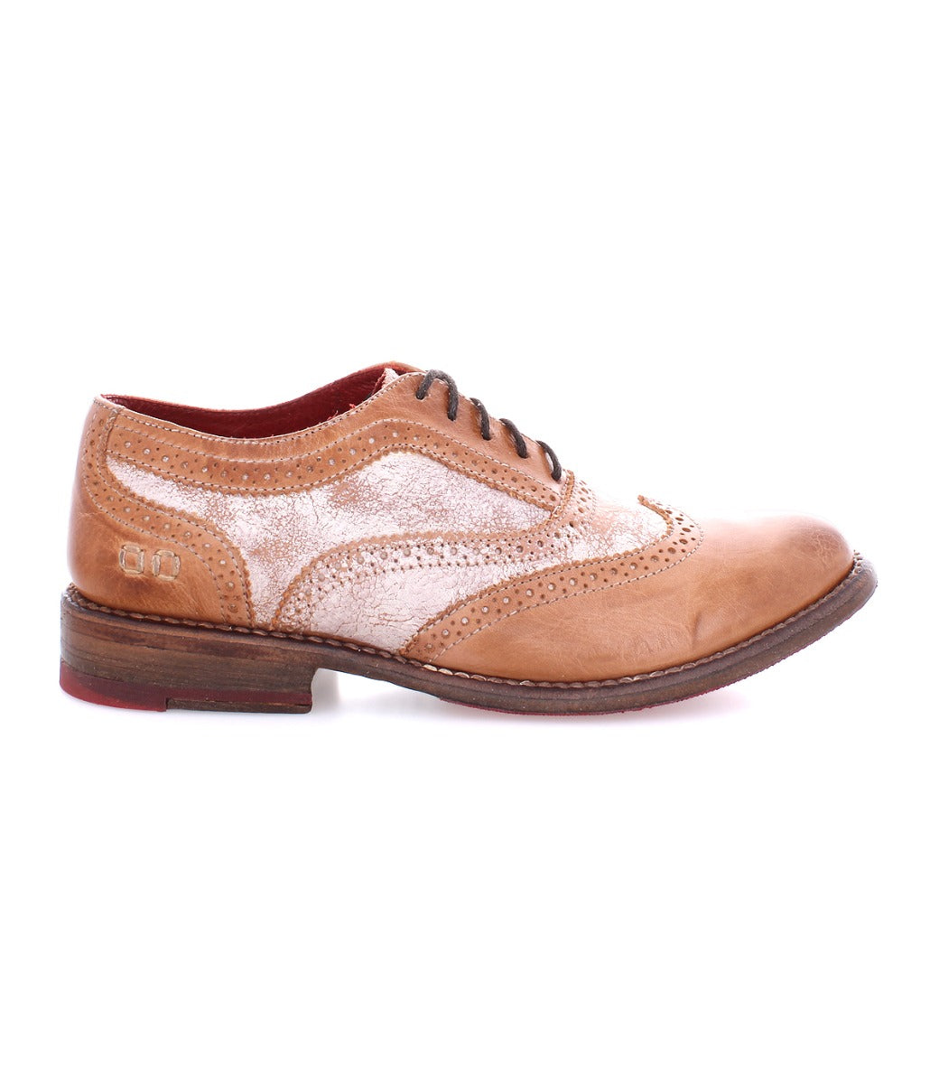 A distressed tan and jasper wingtip oxford shoe called Lita by Bed Stu.