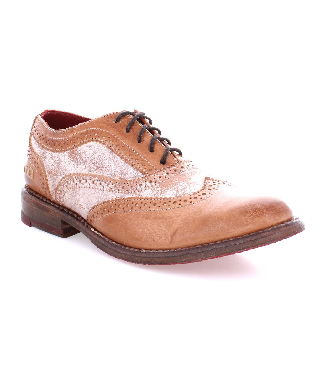 A distressed tan and jasper wingtip oxford shoe called Lita by Bed Stu.