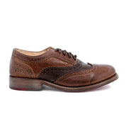 A brown wingtip Oxford shoe called the Lita by Bed Stu.
