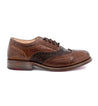 A brown wingtip Oxford shoe called the Lita by Bed Stu.