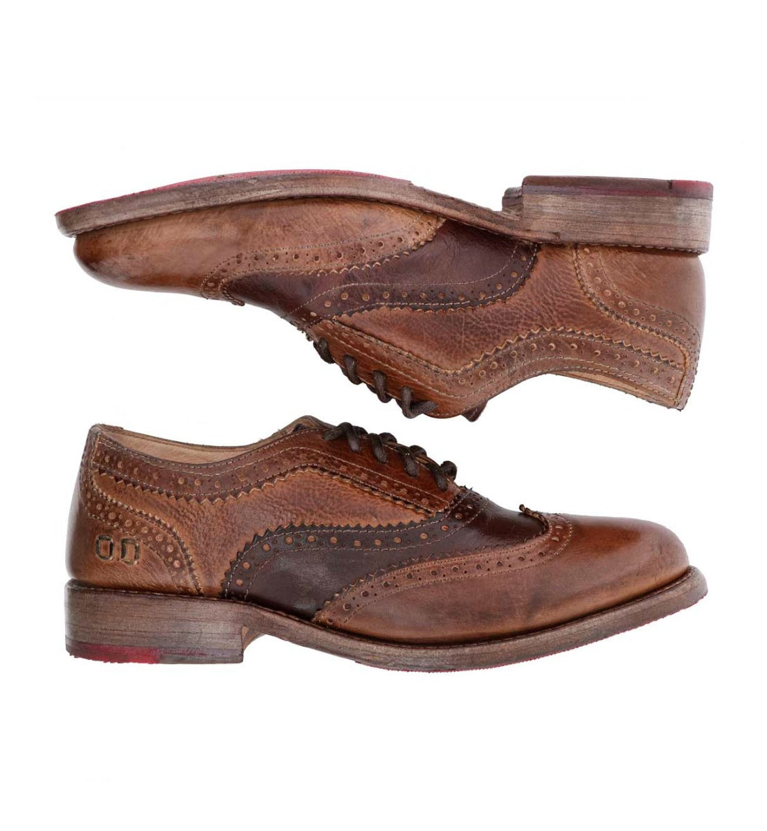A pair of Bed Stu brown wingtip oxford shoes.