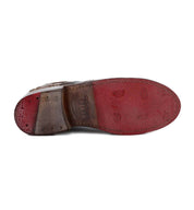 Lita shoe by Bed Stu with red soles.