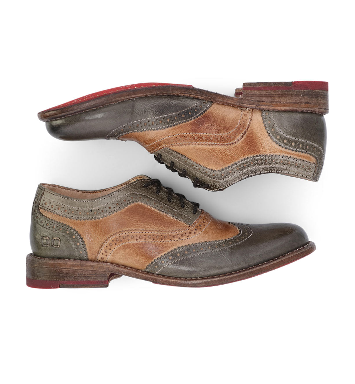 A pair of green and tan wingtip oxford shoes, the Lita by Bed Stu.