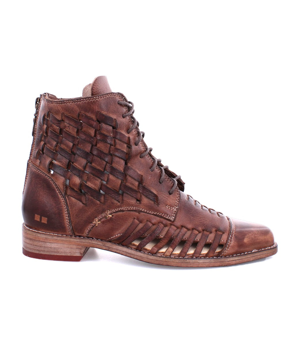 A brown leather Loretta boot with woven details by Bed Stu.