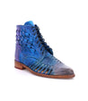 A women's blue ankle boot with braided detailing, the Loretta boot by Bed Stu.