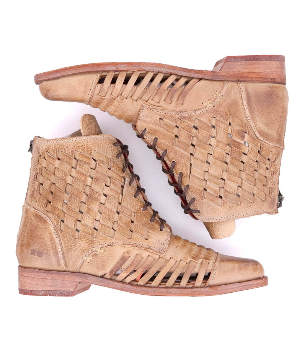 A pair of Loretta boots by Bed Stu with woven details.