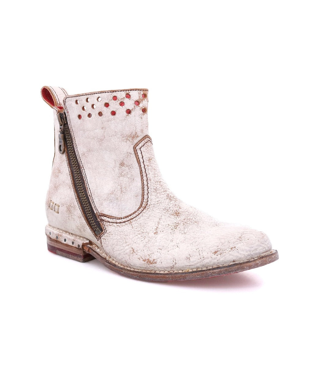 A women's white ankle boot with a zipper on the side, Lotus by Bed Stu.