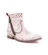 A women's white ankle boot with a zipper on the side, Lotus by Bed Stu.