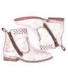 A pair of white Lotus ankle boots with red detailing, by Bed Stu.