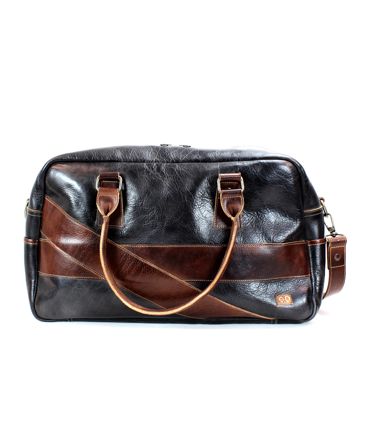 A Bed Stu Luke brown leather duffle bag with two short handles, a detachable and adjustable crossbody strap, and decorative stitching details makes the perfect travel companion.