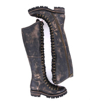 A pair of Bed Stu Lustrous black leather boots on a white background.