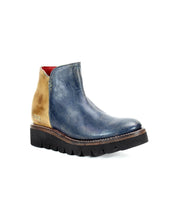 Image of the Lydyi leather ankle boot by Bed Stu with a blue front and tan back on a lightweight platform outsole. The boot features contrast stitching, a cushioned breathable insole, and a red interior lining.