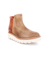 A women's Lydyi ankle boot in tan with a white sole by Bed Stu.