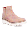 A Lydyi by Bed Stu women's pink ankle boot with a white sole.