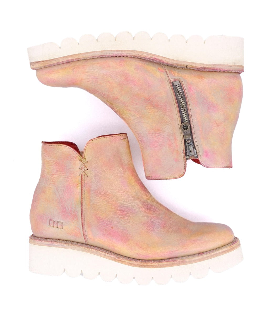 A pair of Bed Stu Lydyi ankle boots in pink and yellow.