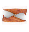 A pair of Lyne sneakers by Bed Stu, made of tan leather with pink dots.