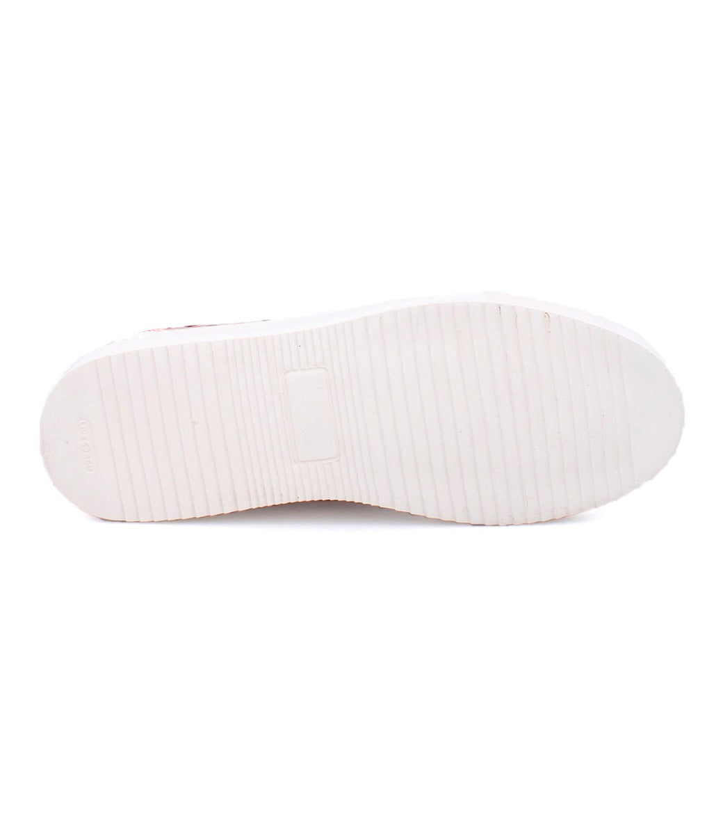 A Lyne sneaker with white soles on a white background. (Brand: Bed Stu)