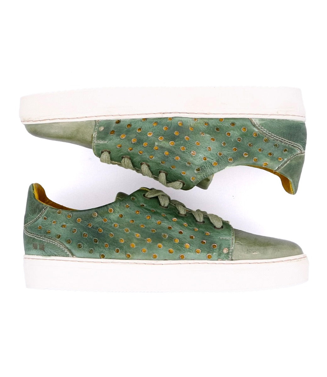 A pair of green Lyne sneakers with yellow dots from Bed Stu.