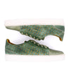 A pair of green Lyne sneakers with yellow dots from Bed Stu.