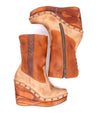 A pair of women's Macarena boots with tan leather and tan stitching by Bed Stu.